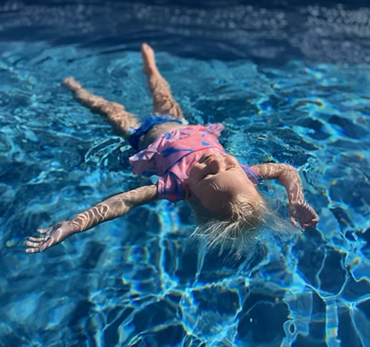Student floating confidently